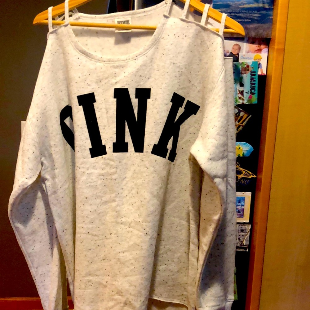 PINK high low sweatshirt. Detailed ladder shoulder. Size M